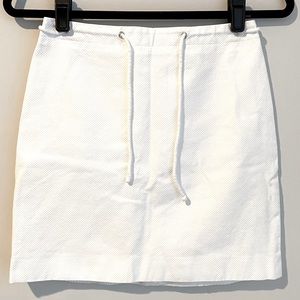 (NWOT) MICHAEL KORS VINTAGE White Mini Skirt with Tors, Size 3
